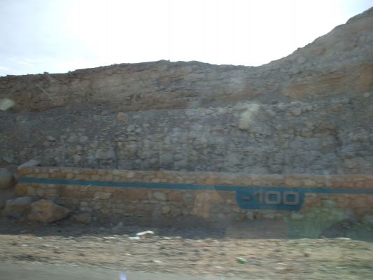 At 100 m under the sea level.
